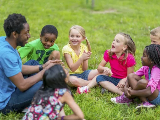 Summer Camp Diverse Kids Sitting on Grass
