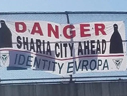 sanctuary city highway banner