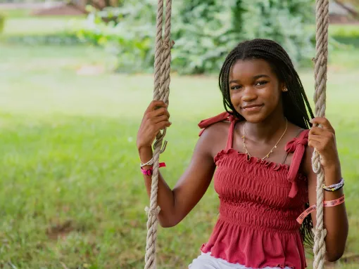 Bellen Woodard on a Swing