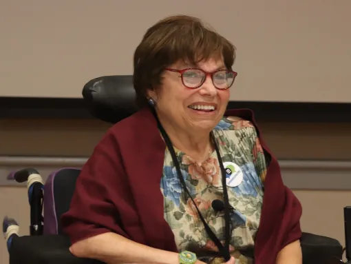 Judith Heumann sitting in a power chair