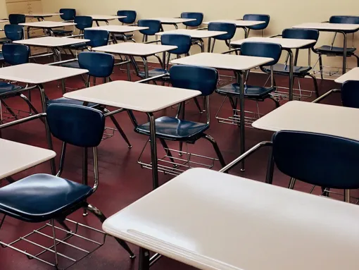 Education classroom rows of desk chairs