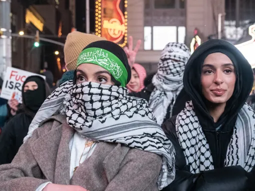 Participants, including one wearing a Hamas-style headband, take part in a pro-Palestinian rally in New York City’s Times Square on January 16, 2025