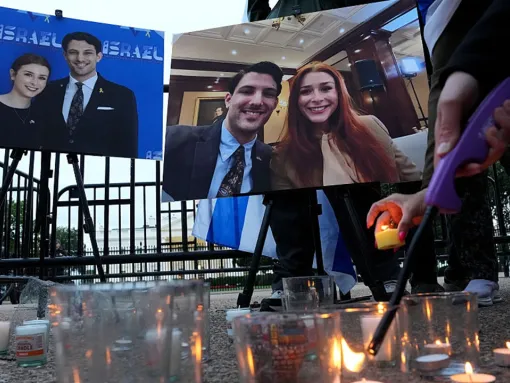 Mourners light candles during a vigil outside of the White House on May 22, 2025, in Washington, DC. for the victims of the Capital Jewish Museum shooting on Wednesday evening.