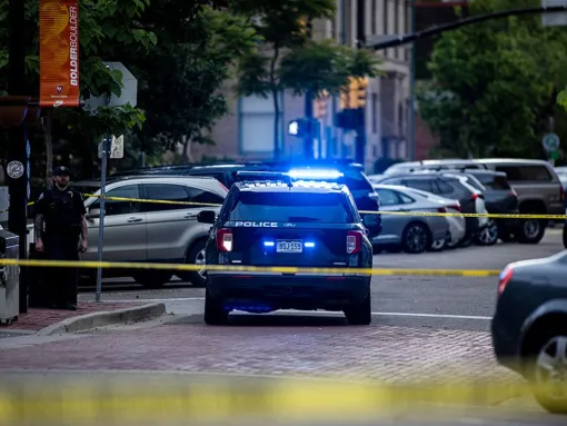 Police cordon off Pearl Street on June 1, 2025, in Boulder, Colorado, where a suspect was taken into custody after reportedly throwing firebombs at a group of people participating in an organized walk in solidarity with hostages held by Hamas in Gaza