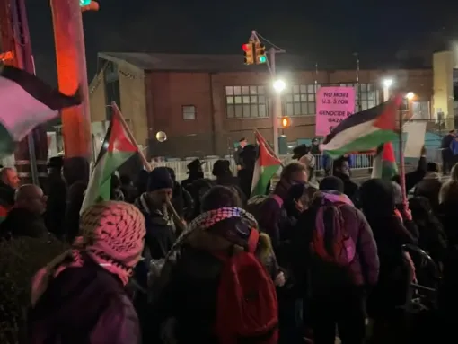 Protesters organized by Pal-Awda participate in a January 8, 2026, protest outside Young Israel of Kew Gardens Hills in Queens, New York