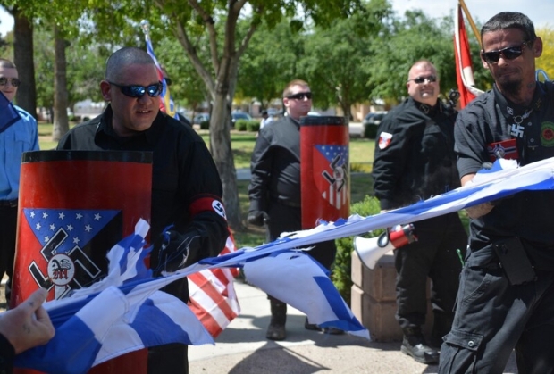 Leader of 14 First burns an Israeli flag
