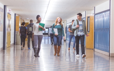 High School Students Walking in Hallway