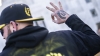 A member of the Proud Boys gestures in front of the Oregon state capitol during a protest on January 8, 2022, in Salem, Oregon, in support of those arrested in the January 6 attack on the U.S. Capitol.
